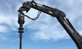 Digga anchor drive on a Volvo excavator against open sky