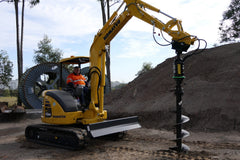 Mini excavator drilling a footing with a Digga auger