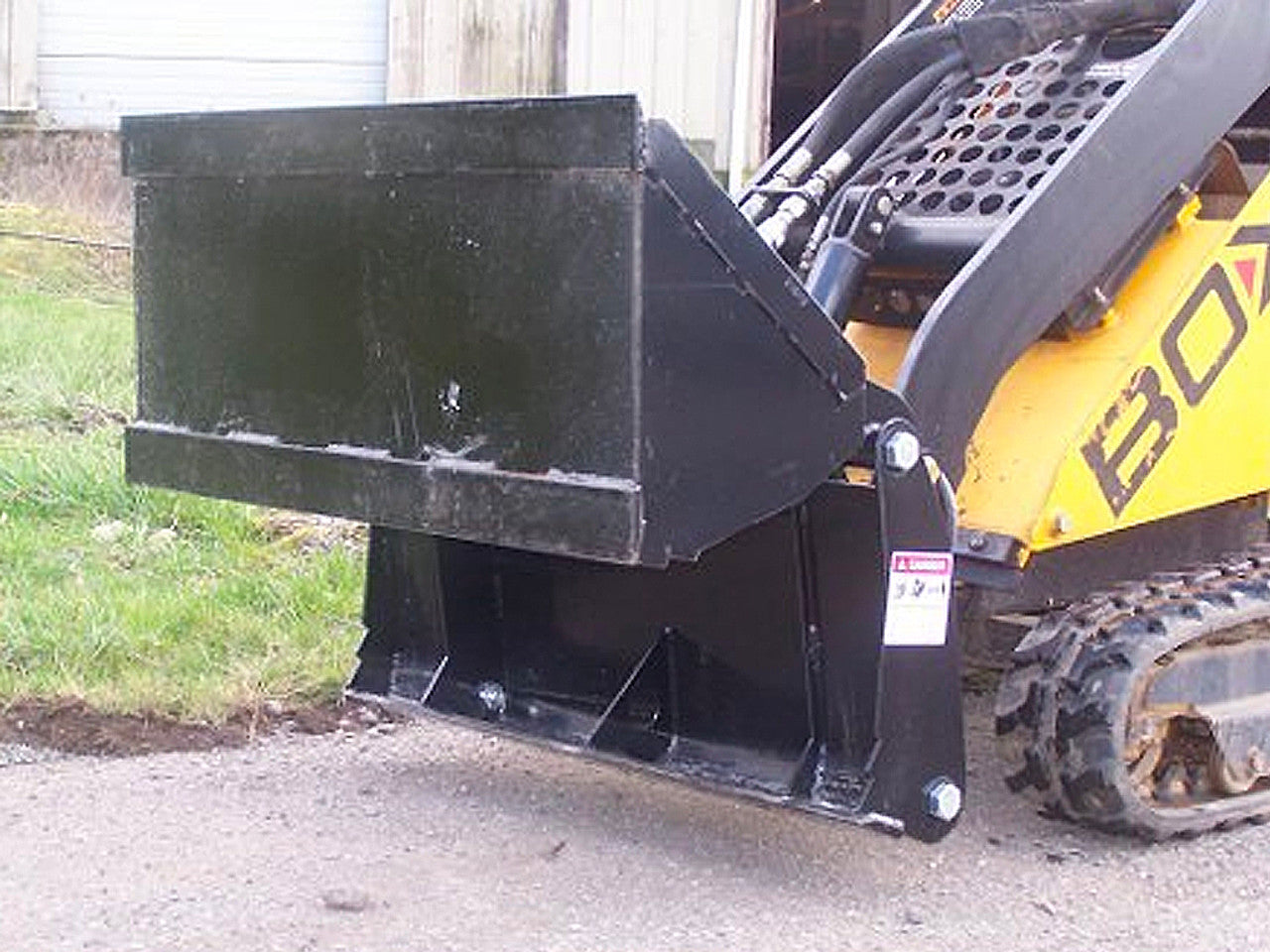 Mini Skid Steer 4 in 1 Bucket Attachment | Bradco By Paladin