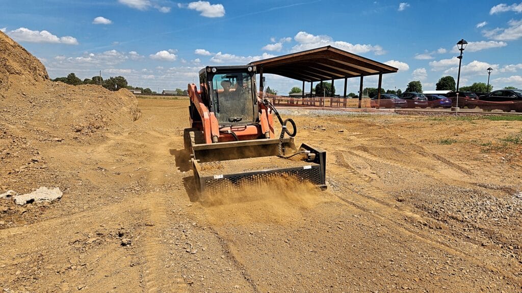Mini Skid Steer Power Rake Attachment by Rockaway